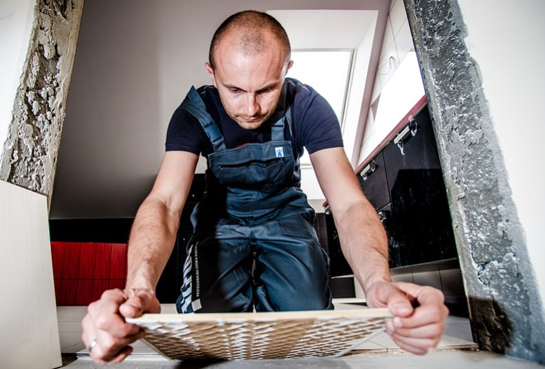 woodworker working in a home in virginia on wage