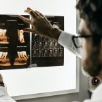 Doctor analysing x-ray