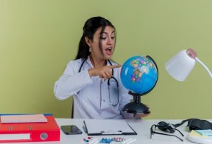 girl-hand-holding-globe-isolated