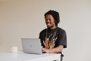 Black person using laptop