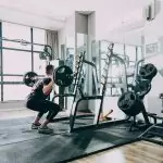 man doing exercise in Gym