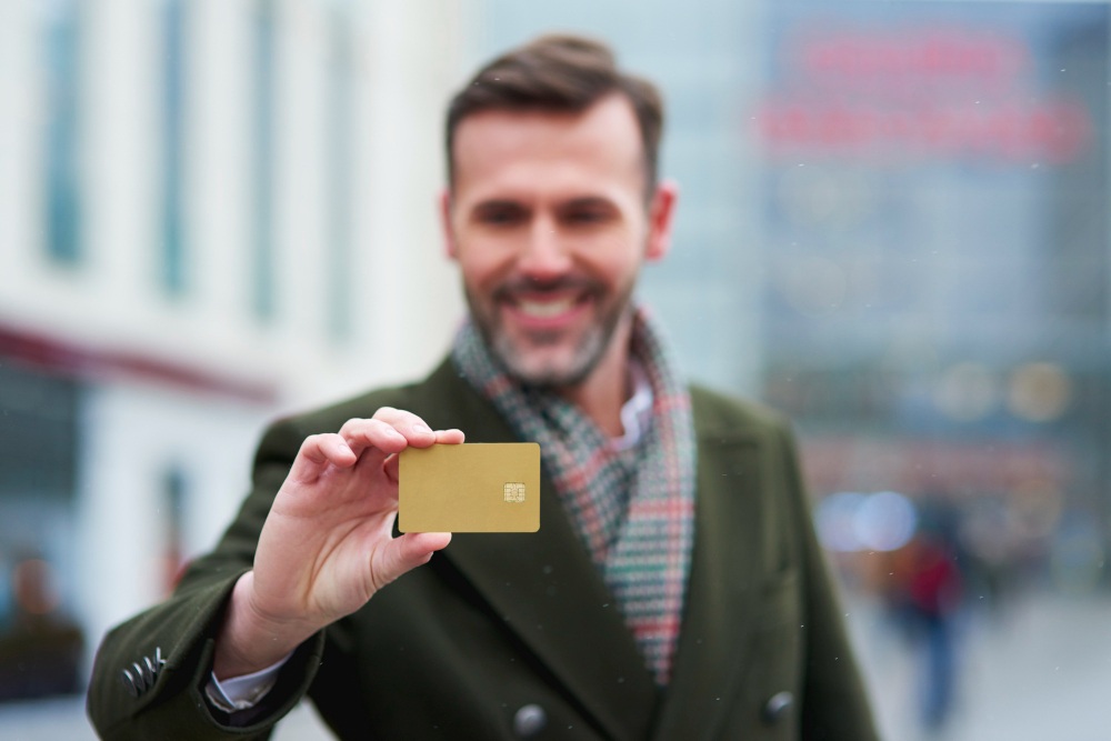 Man Hold a Gold Card]