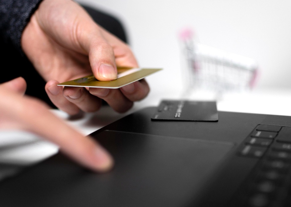 Man Holding a Credit Card