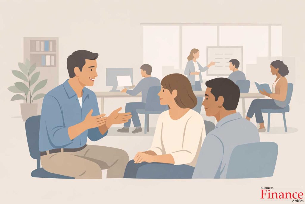 Coaching leader guiding employees through discussion and feedback in a professional workplace